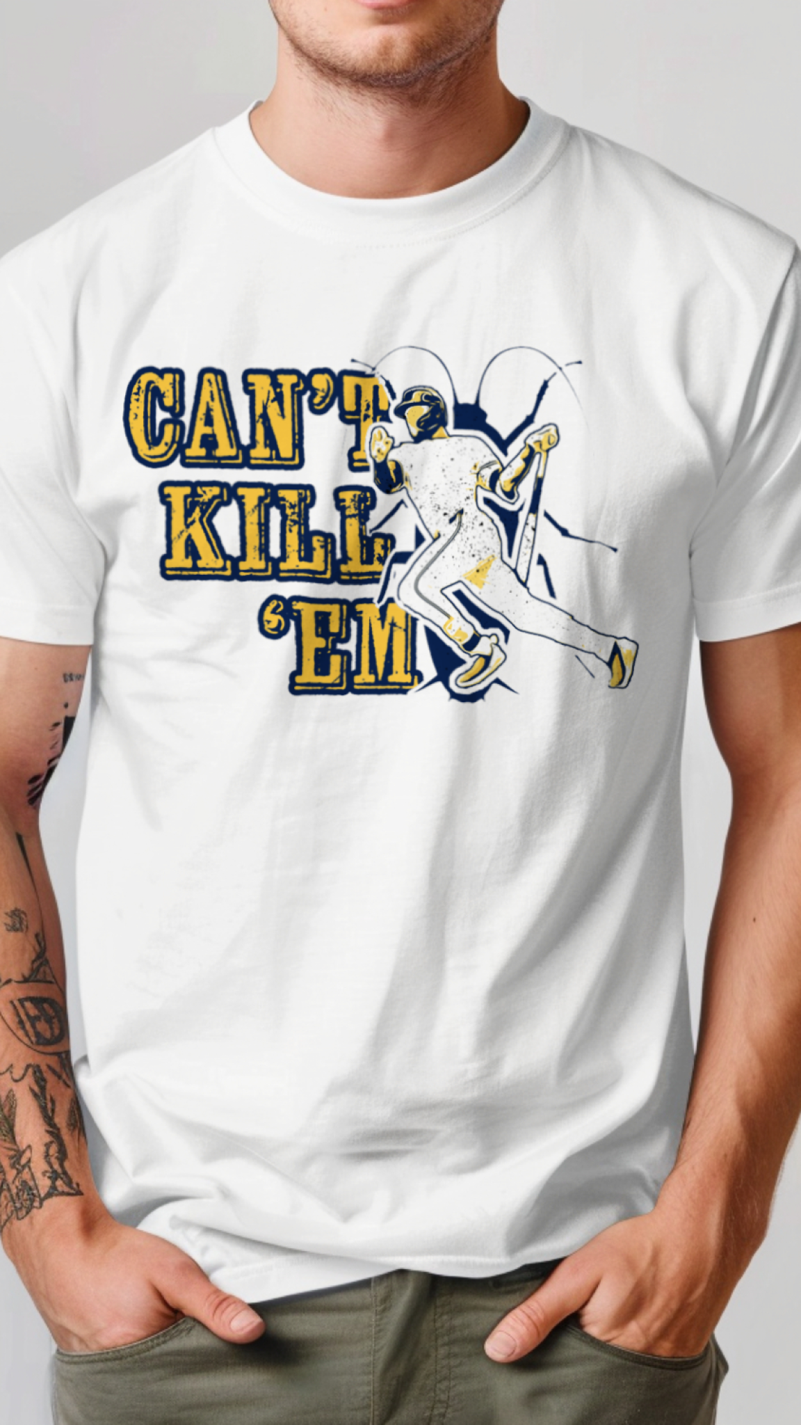 Person wearing a white t-shirt with a graphic design and text on a plain background