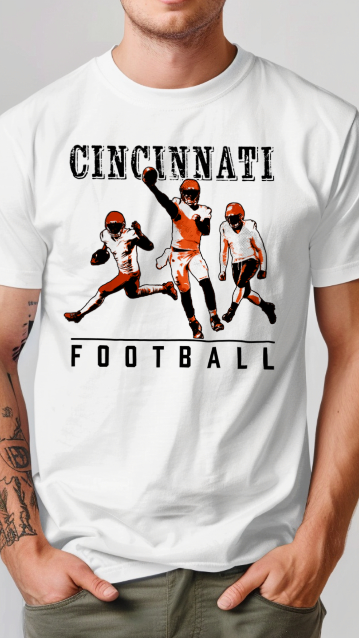 White t-shirt with Cincinnati football graphic on a plain background