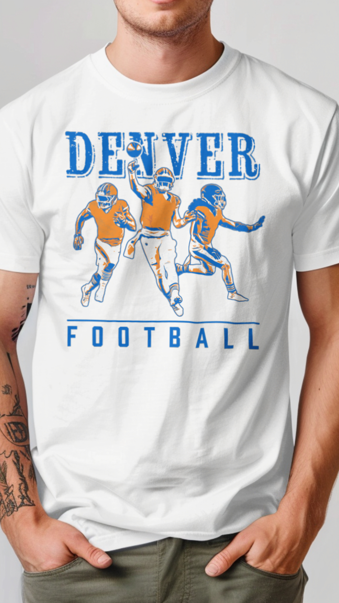 White t-shirt with 'Denver Football' graphic featuring football players on a gray background