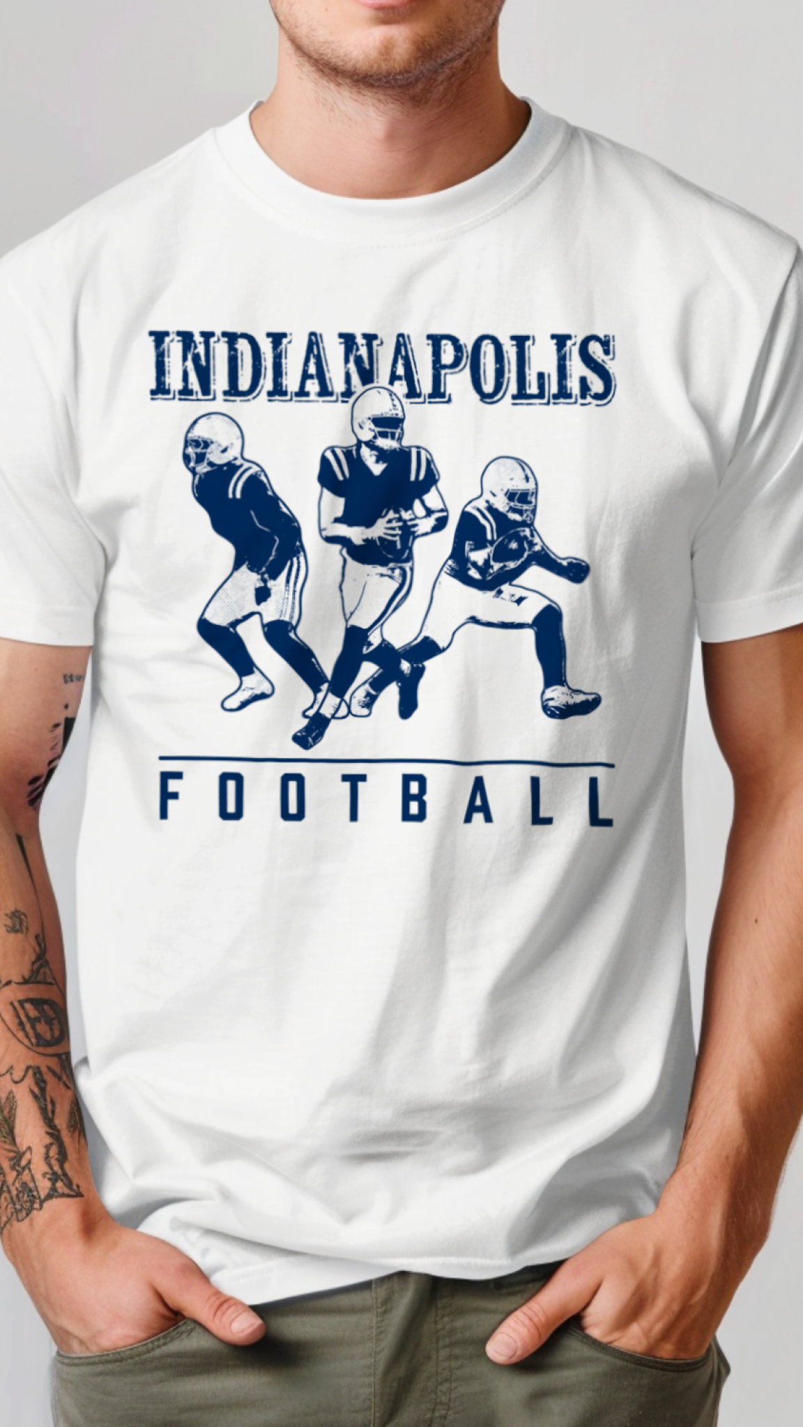 White t-shirt with Indianapolis football graphic on a plain background