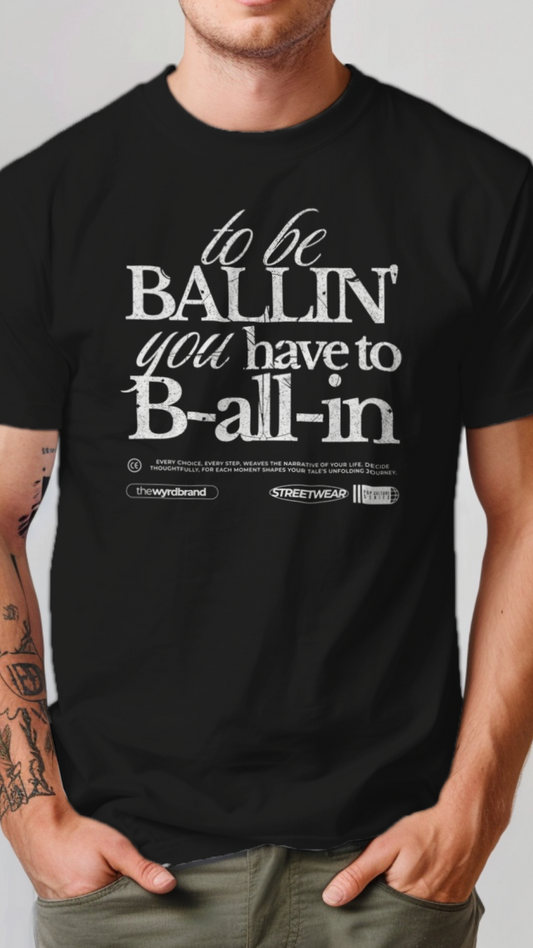 Person wearing a black t-shirt with white text on a plain background