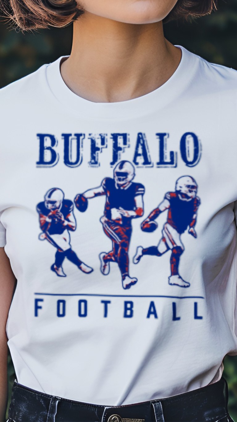 Person wearing a white t-shirt with 'Buffalo Football' design outdoors.