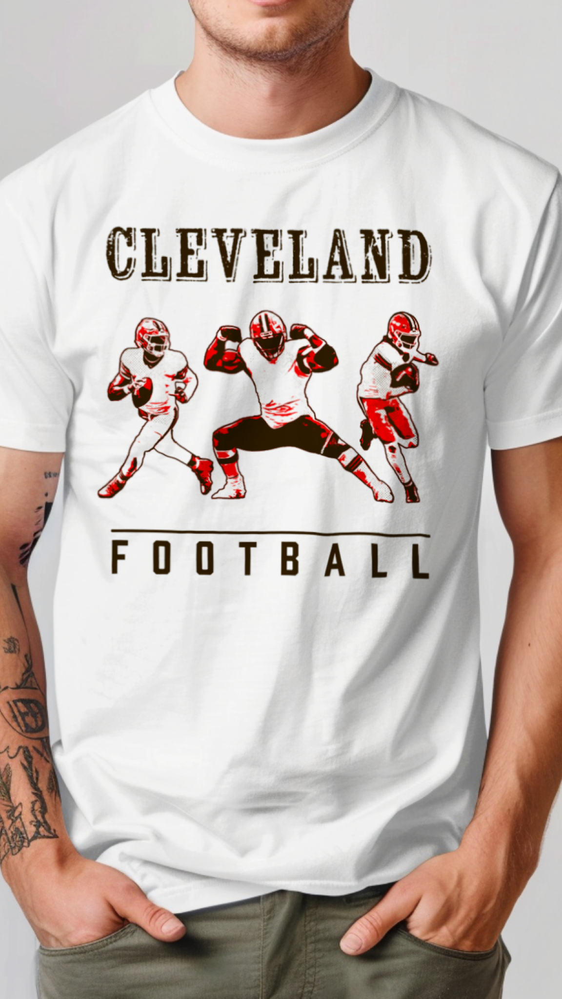 White t-shirt with 'Cleveland Football' graphic featuring football players on a plain background