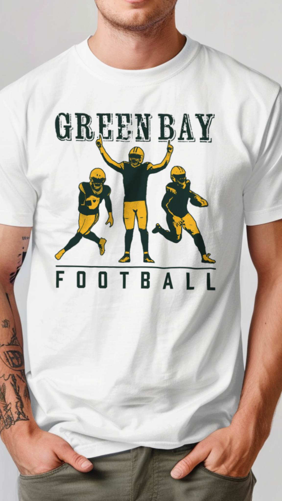 White t-shirt with 'Green Bay Football' graphic featuring football players on a plain background