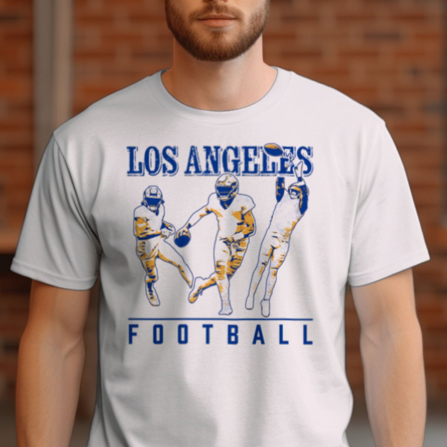 Man wearing a white t-shirt with 'Los Angeles Football' design in a room with brick walls and a window.