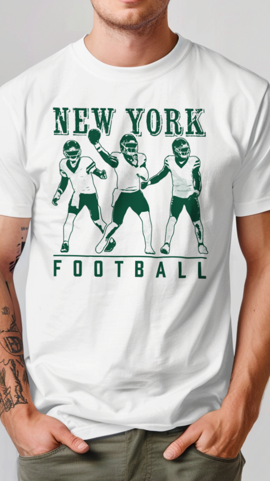 White t-shirt with green New York football graphic on a plain background